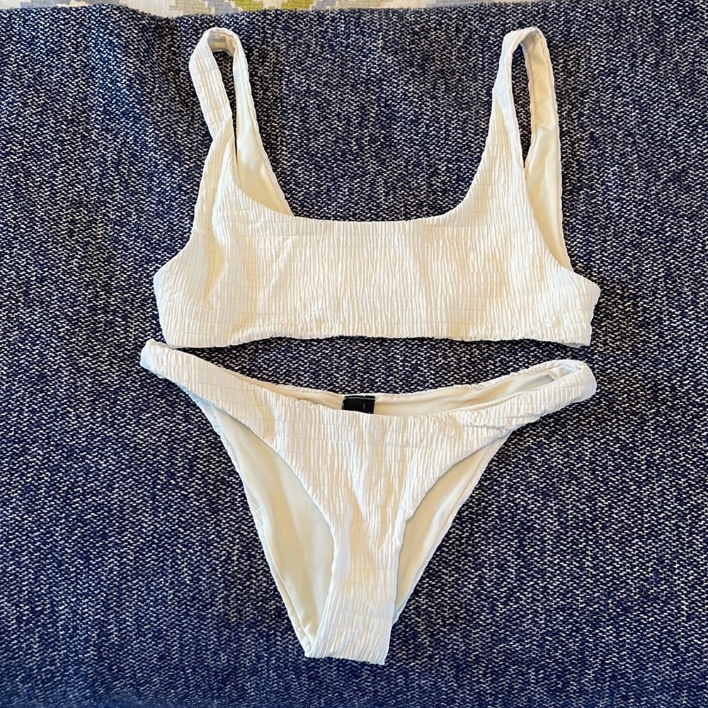 Selling white triangl swimwear bikini set!